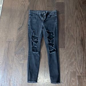 American Eagle black ripped jeans size 10 next level stretch high-rise